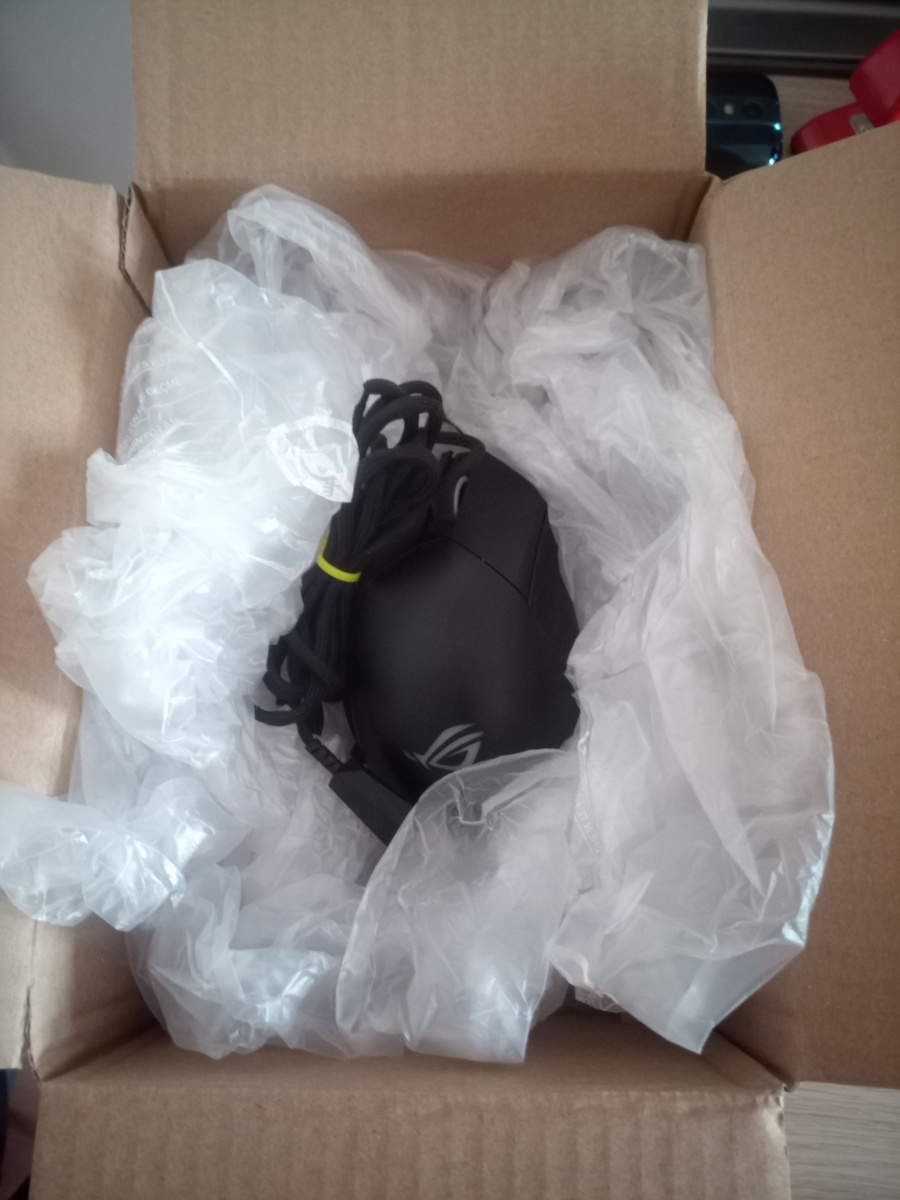 picture of ROG Gladius III mouse in a box with cushioning