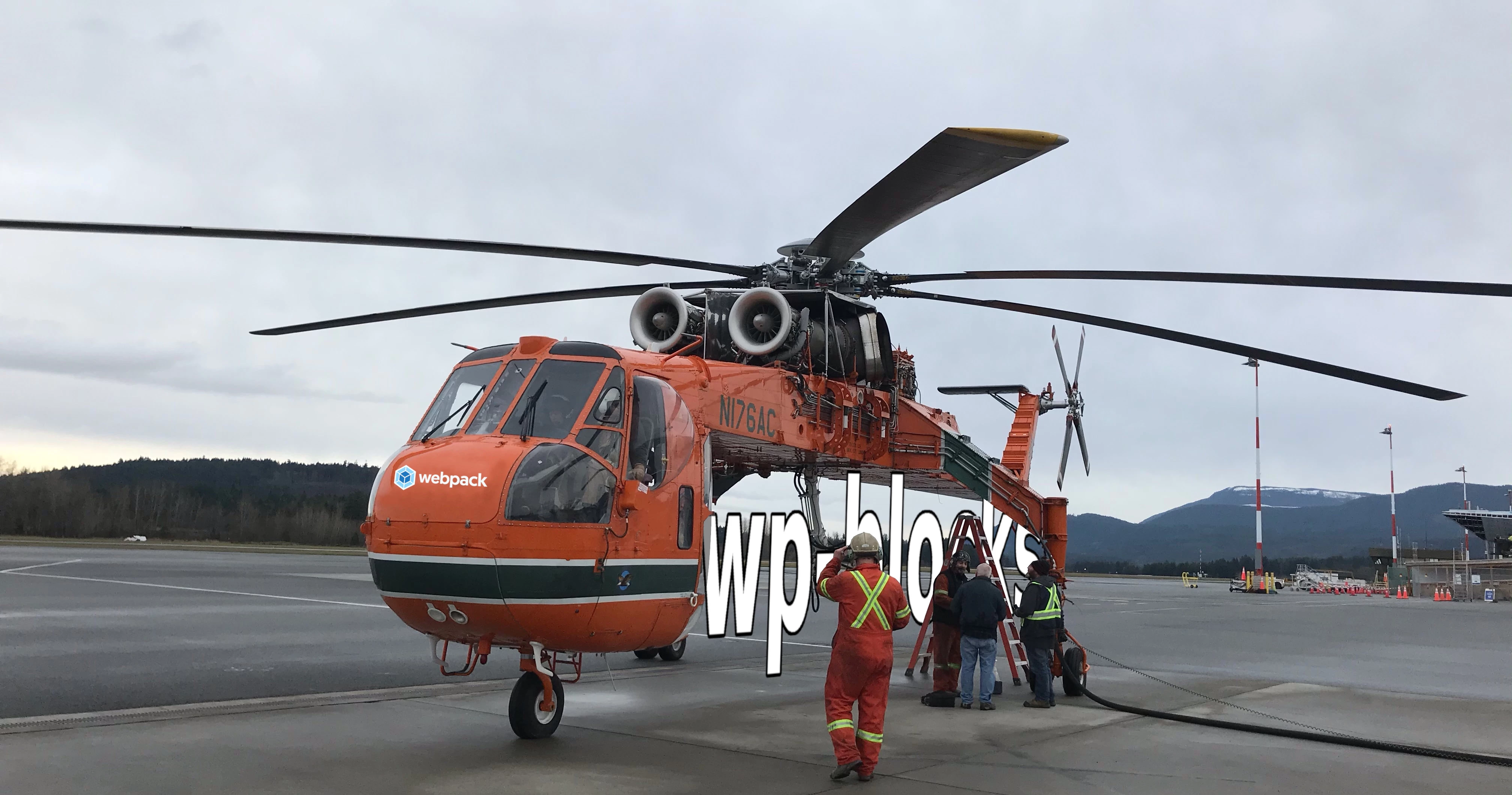 picture of grounded helicopter with the word wp-blocks in cargo place