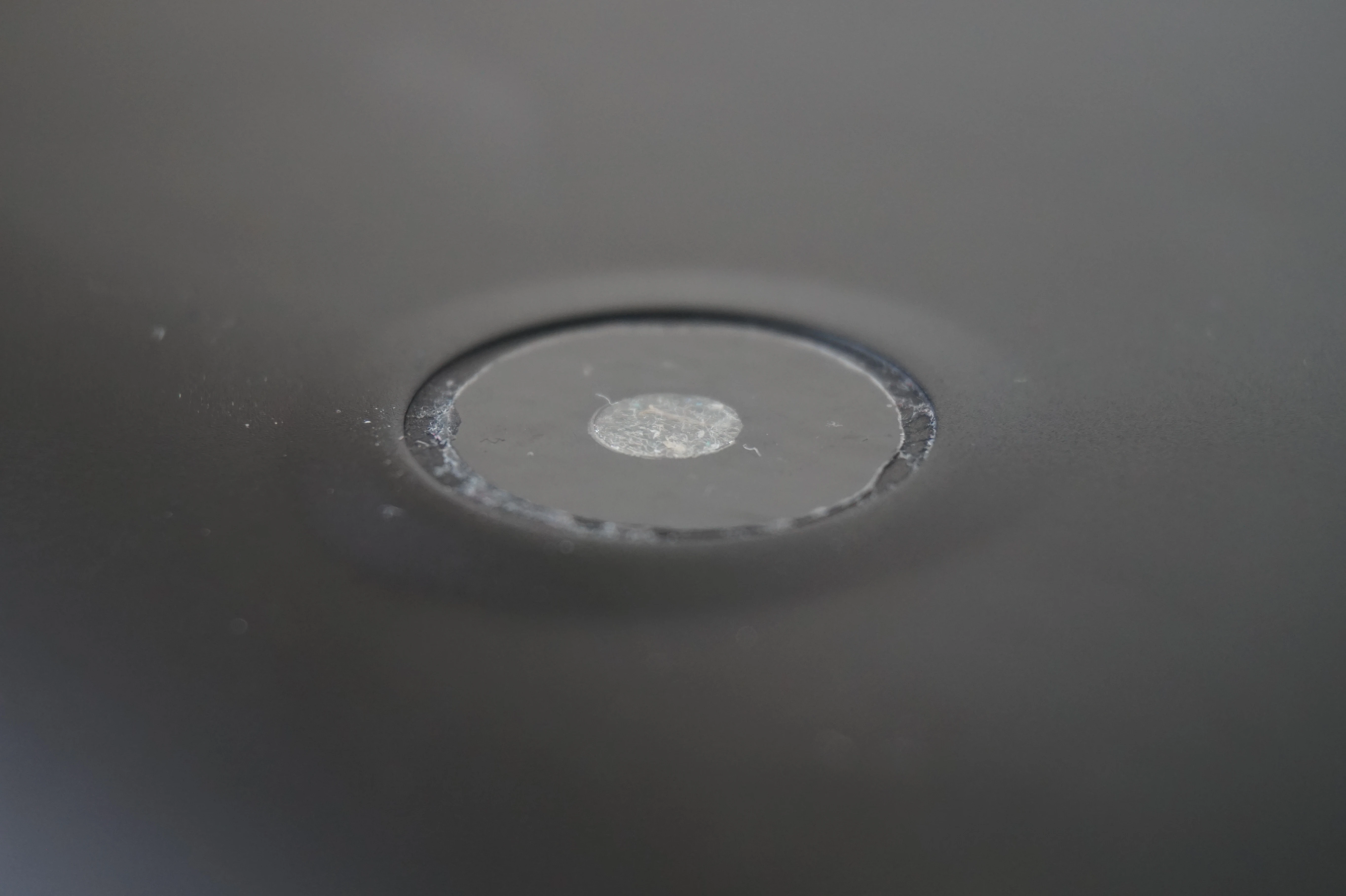 close of missing foot pad on bottom of Starbook